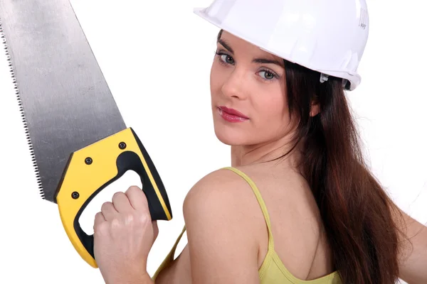 Woman with a saw — Stock Photo, Image