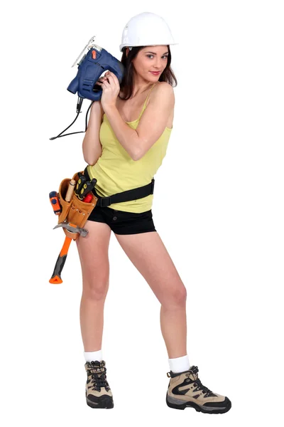 Sexy vrouw met chainsaw — Stockfoto