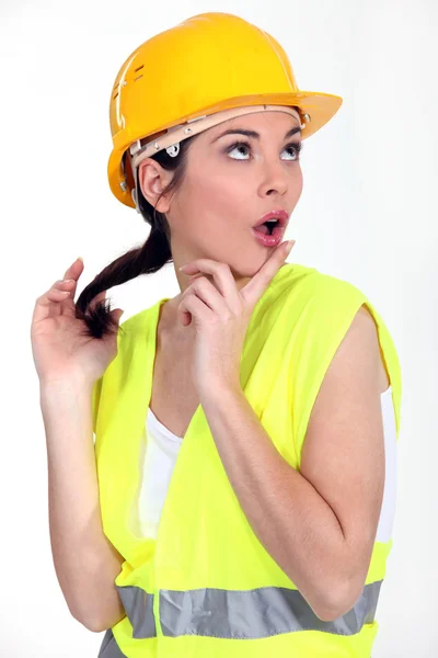Mulher com capacete amarelo — Fotografia de Stock