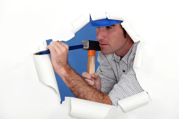 Man carefully using hammer and chisel — Stock Photo, Image