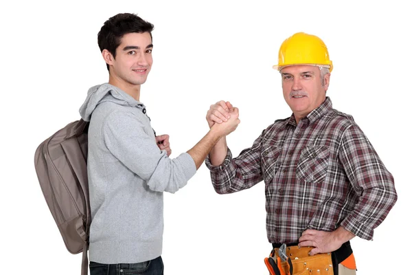 Builder hälsning nya arbetare — Stockfoto