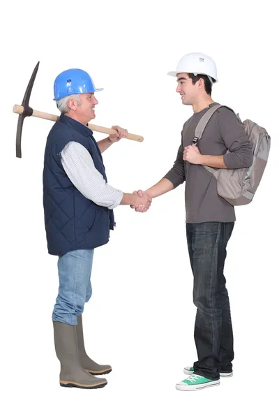 Apprentice shaking hands — Stock Photo, Image