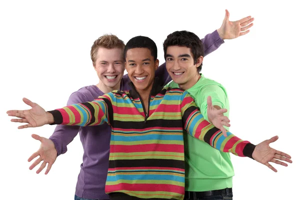 Three male friends making welcome gesture — Stock Photo, Image