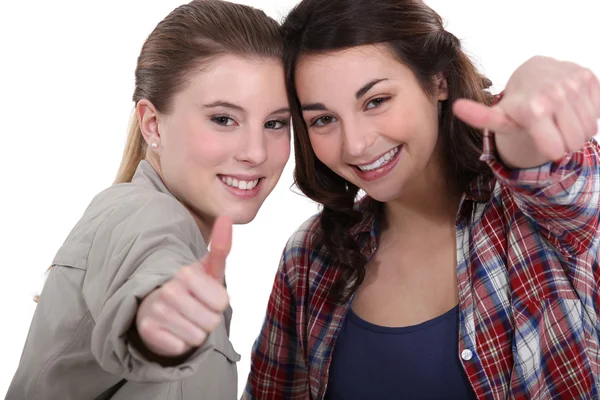 Young women giving the thumb's up — Stock Photo, Image