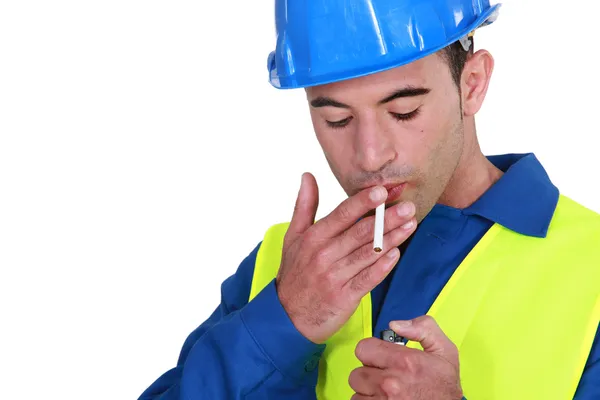 Mason com cigarro aceso — Fotografia de Stock