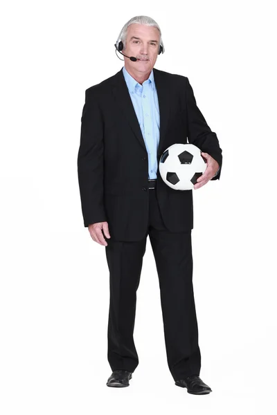 Fußballkommentator mit Ball — Stockfoto