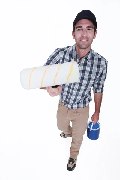 Man with a clean paint roller — Stock Photo, Image