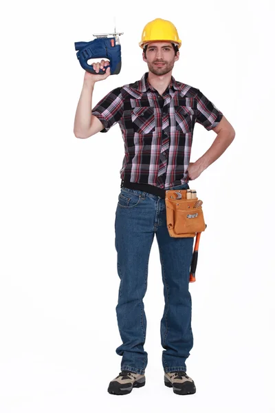Carpenter holding chainsaw — Stock Photo, Image