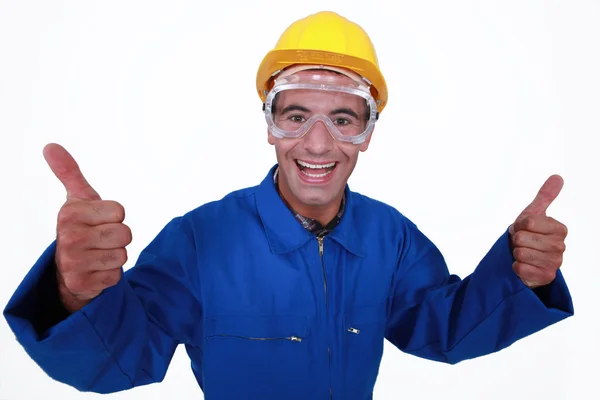 Elated tradesman giving two thumb's up — Stock Photo, Image