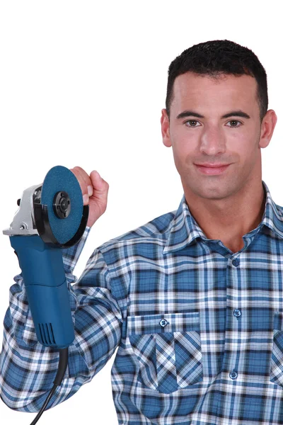 Man holding angle-grinder — Stock Photo, Image