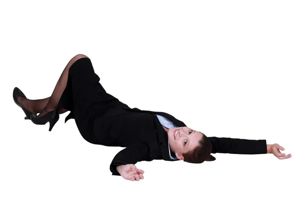 Businesswoman laying on the floor — Stock Photo, Image