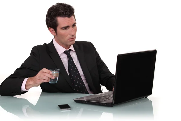 Office worker drinking glass of water — Stock Photo, Image