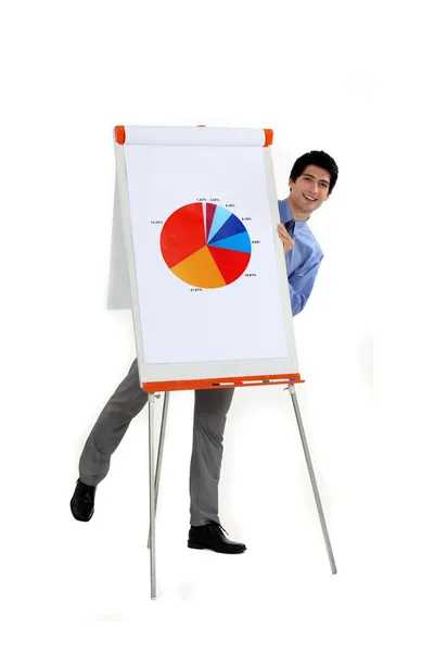 Empresário atraente fazendo apresentação com gráfico de torta — Fotografia de Stock