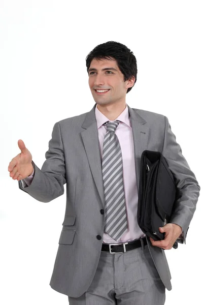Businessman offering his hand — Stock Photo, Image
