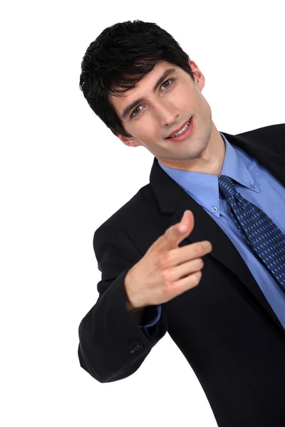 Businessman giving a hand gesture — Stock Photo, Image