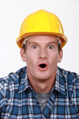 Builder in state of disbelief clipart