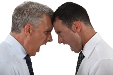 Two businessmen having an argument clipart