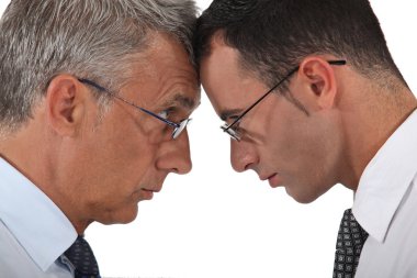 Businessmen head to head clipart