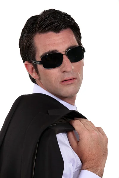 Homem usando óculos escuros — Fotografia de Stock