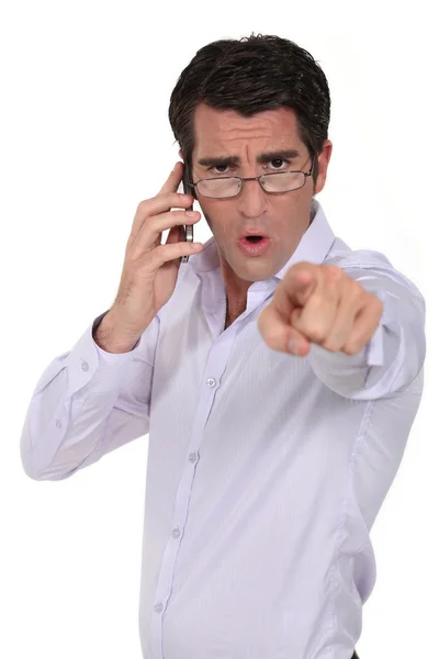 Angry man pointing his finger — Stock Photo, Image