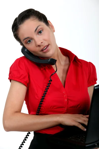 Businesswoman multitasking — Stock Photo, Image