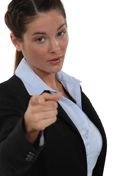A businesswoman pointing at the camera. — Stock Photo, Image