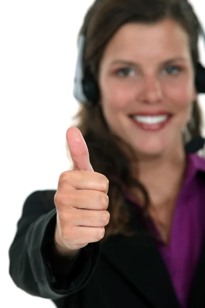 Call centre agent giving the thumb's up — Stock Photo, Image