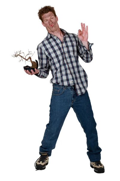 Fremder Mann stand mit verbrannter Pflanze — Stockfoto