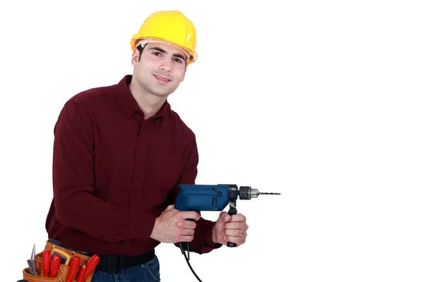 Homem usando broca de energia — Fotografia de Stock