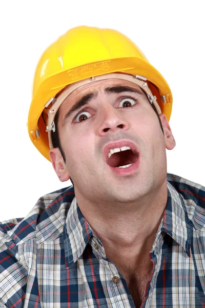 A horrified tradesman — Stock Photo, Image