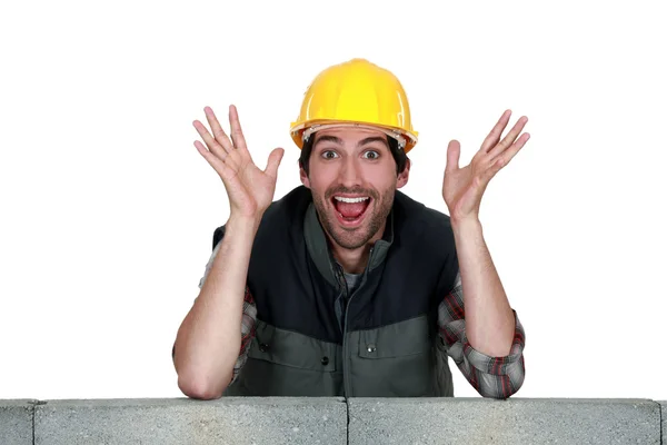 Craftsman laughing and gesturing — Stock Photo, Image