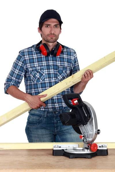 Carpenter with circular saw — Stock Photo, Image