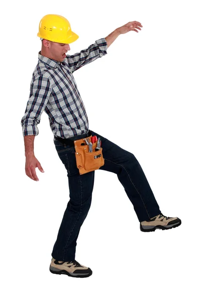 Tradesman che cammina attraverso un funambolo — Foto Stock