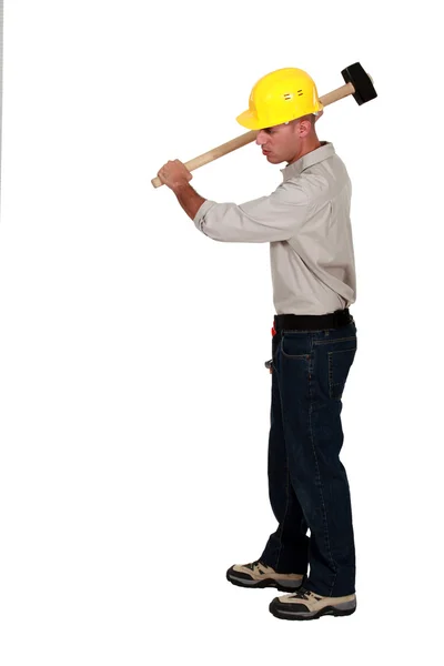 Craftsman hitting with his hammer — Stock Photo, Image