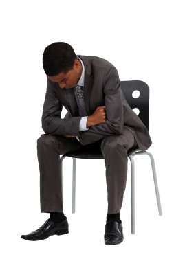 Downcast young businessman clipart