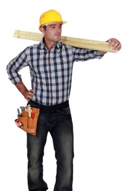Craftsman carrying a wooden board clipart