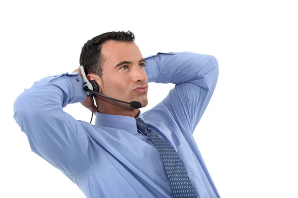 Lazy male call-center operative — Stock Photo, Image