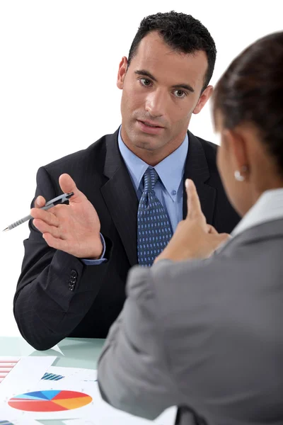Businessman and businesswoman having a discussion — Stock Photo, Image