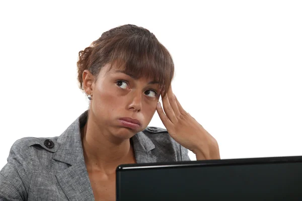 Bored female office worker — Stock Photo, Image