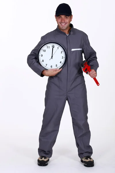 Craftsman wrench and clock — Stock Photo, Image