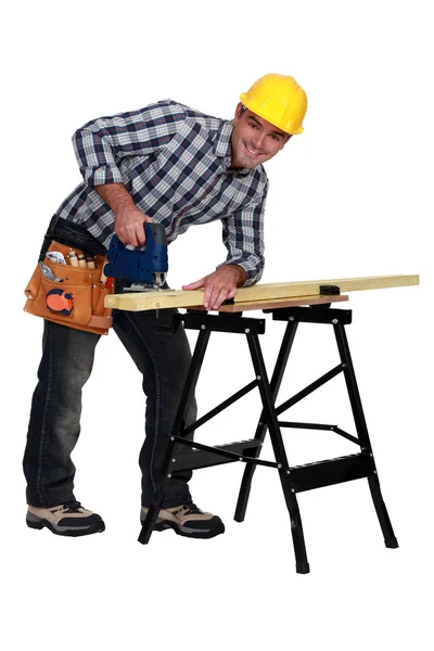 A man using a jigsaw — Stock Photo, Image
