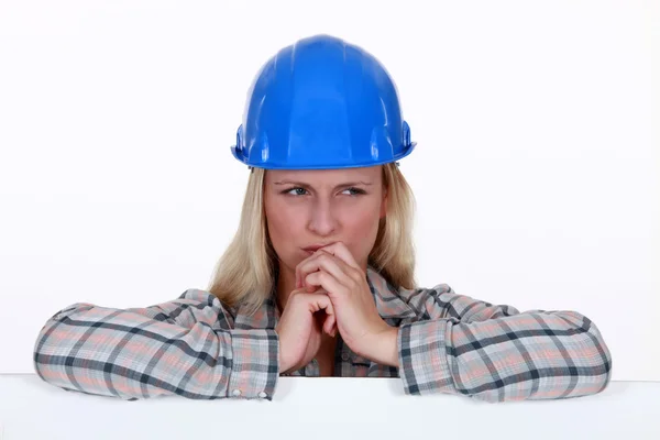 Confused female laborer — Stock Photo, Image