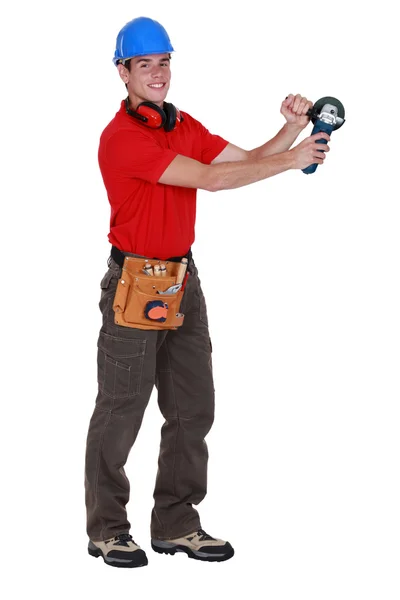 Man holding angle grinder — Stock Photo, Image