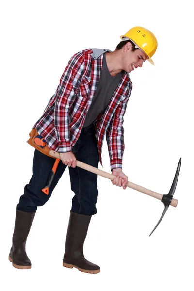 Labourer performing back-breaking work — Stock Photo, Image