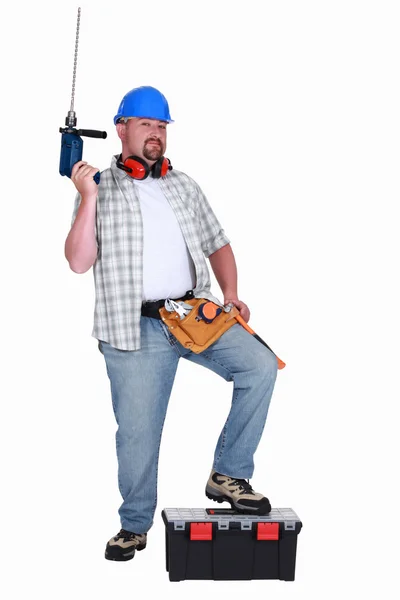 Handyman showing off all of his tools — Stock Photo, Image