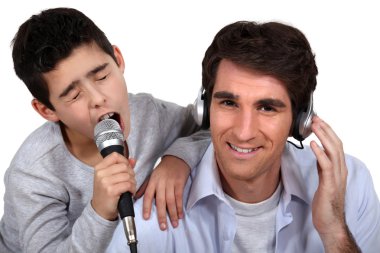 Father and son musical duo clipart