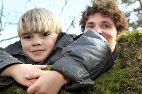 Father and son in the woods — Stock Photo, Image