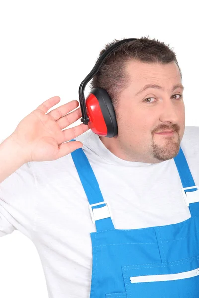 Man wearing ear defenders — Stock Photo, Image