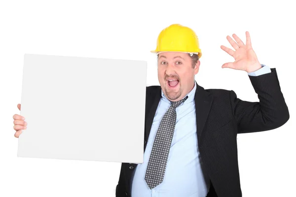 Empresário de construção segurando uma placa vazia — Fotografia de Stock