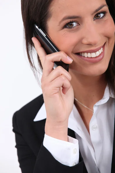 Giovane donna d'affari con telefono cellulare — Foto Stock